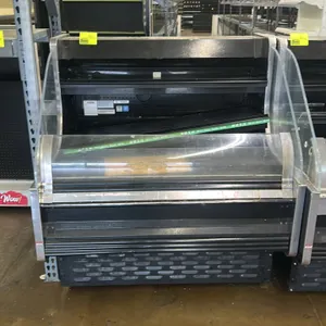 Heatcraft SX1LC-04CUN self-contained refrigerated berry display case. Features solid shelving and clear acrylic side panels. Refrigerant: R-404A. Elec