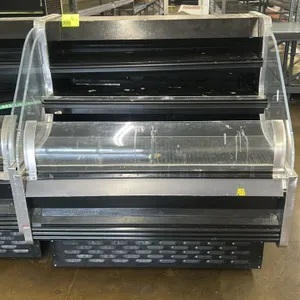 Kysor Warren SX1LC004CUN self-contained produce and berry display case. Features clear side panels, 2 solid shelves, and wire bottom racks. S/N: C15F0