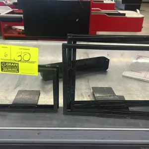 Metal sign holders. Features black metal construction with flat bases. Lot includes (2) 9" and (4) 11" holders.