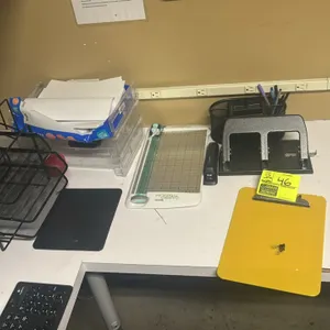 Lot of assorted office supplies. Includes Westcott Carbo Titanium rotary paper cutter, Swingline stapler, heavy-duty 3-hole punch, yellow clipboard, b