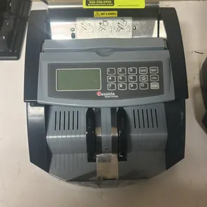 Cassida 5520UV/MG bill counter. Features a digital display and numeric keypad. Equipped with ultraviolet (UV) and magnetic (MG) counterfeit detection.