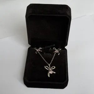 New Platinum Plated 0.5 Carat 2 Piece Bow Set