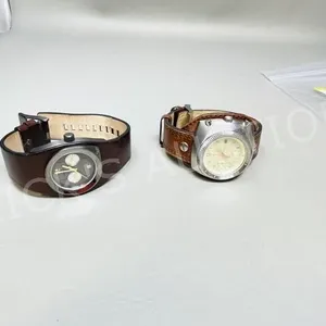pair-modern Diesel watches w/ leather straps