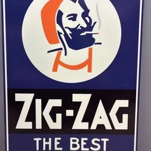 REPRODUCTION Dibond Zig-Zag sign. 13.5”W x 9”H.