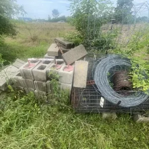 Concrete Blocks - Hog Wire - Barbed Wire in Pile