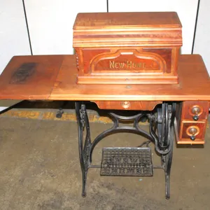 New Home Treadle Sewing Machine in Wooden Cabinet with Cast Iron Base
