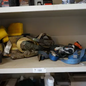 Contents of Shelf of Misc. Tie Down Straps