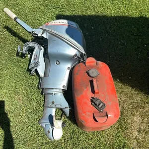 EVINRUDE BOAT MOTOR AND GAS TANK