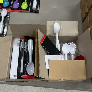 Bulk lot of assorted plastic ice cream scoops. Features a variety of colors including white, green, purple, blue, and red. Includes both individually 