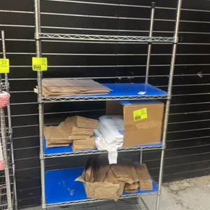 Metro style metal wire shelving unit. Features 5 adjustable shelves and 3 blue plastic liners. Dimensions: 3'L x 1.5'W x 6.5'H. Mounted on leveling fe