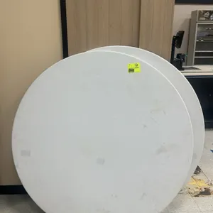 Poly round folding table. Features a white molded polyethylene top and a folding metal frame. 5' diameter.