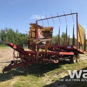 NEW HOLLAND 1033 T/A BALE WAGON