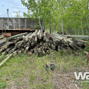 QTY OF ASSORTED 6-12 FT TREATED FENCE POST