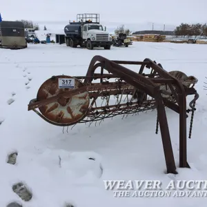 MCCORMICK SIDE DELIVERY HAY RAKE