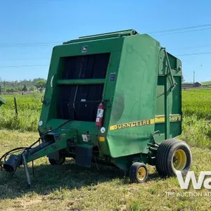 1997 JOHN DEERE 566 5X6 FT. ROUND BALER
