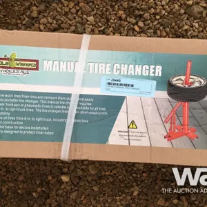 (UNUSED) MANUAL TIRE CHANGER