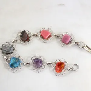 MULTI-GEMSTONE SP IN FILIGREE SETTING BRAC.