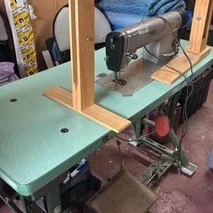 Commercial PFAFF sewing machine on stand