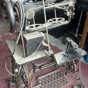 Antique leather, working singer, sewing machine