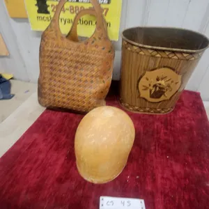 Tooled Leather Handbag, Decorative Metal Wastebasket, and Wooden Egg