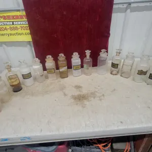 Collection of Vintage Apothecary Jars with Ground Glass Stoppers and Chemical Labels 15x