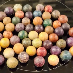 50+ Antique Clay Marbles with Vibrant Colors