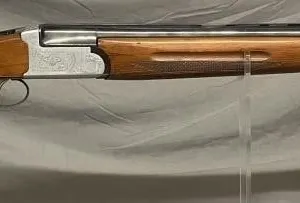 Navy Arms Co. 12 ga. over/under shotgun. 23/4”