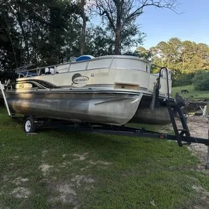 Sunrises pontoon boat Mercury boat motor and