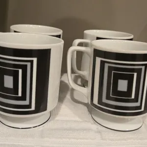 33 - Set of 4 Fred Roberts Op art black and white footed coffee mugs.  Retro MCM.  No chips or crack