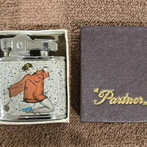47 - Vintage Partner brand lighter in original box.  Appears to be unused.  1950s era pin-up girl.