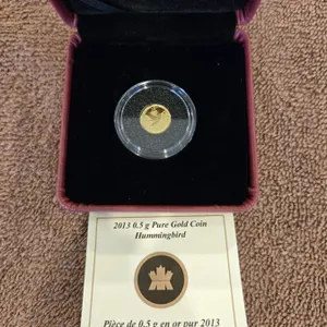 40 - RCM 2013 fine gold coin, hummingbird design 25 cent pure gold. Original box and COA.