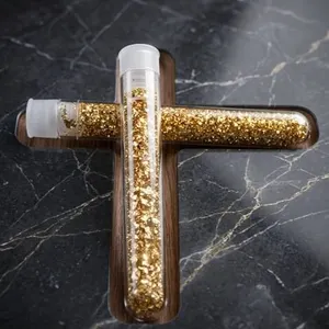 Two Large Vials of Golden flake material