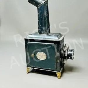 Antique German candle lit slide projector