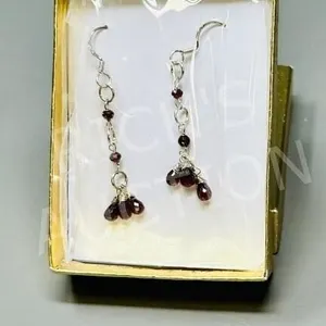 pair of 925 sterling earrings w/ red stones