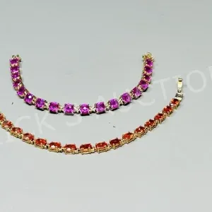 2 gold tone fashion bracelets