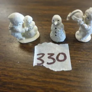 MINIATURE PEWTER SNOW BABY