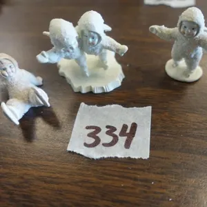MINIATURE PEWTER SNOW BABY