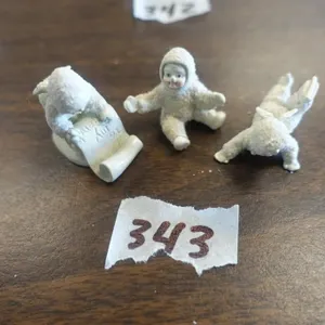 MINIATURE PEWTER SNOW BABY