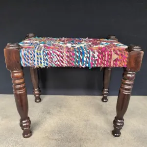 Handcrafted mango wood stool with handwoven seat