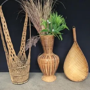 Delicate wicker baskets and vase