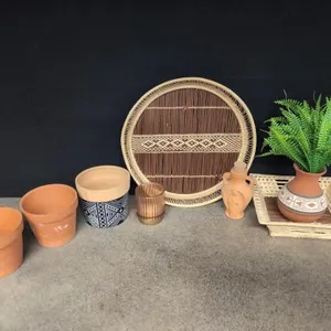Cute little terracotta planters and woven basket