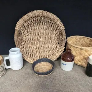 Small stoneware containers and woven baskets