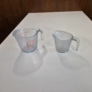 (2) Assorted Frosted Glass Measuring Cups