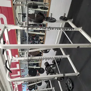 Full Rack, (1) 45# Bar, (6) 45# Plates, (2) 35# Plates, (2) 25# Plates, (2) 10# Plates,