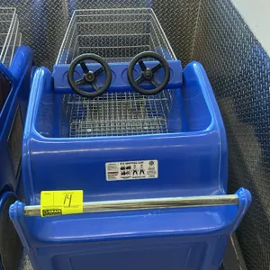 RTS Retail Racecart kiddie shopping cart. Features a blue plastic race car body with number 32 decals, dual steering wheels, and a child seating area 