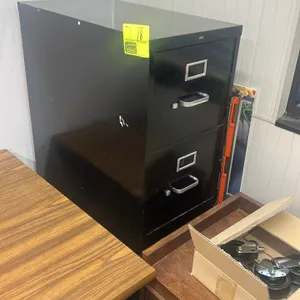 4-drawer metal vertical filing cabinet. Features a black finish, pull handles, and integrated label holders. 28" x 15". Note: Other office furniture a