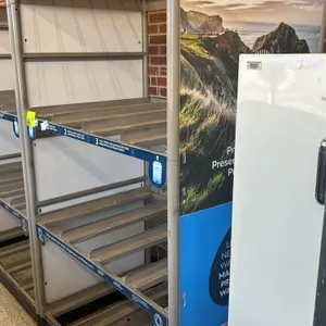 Primo 3-tier metal water bottle display rack. Features channels and wire dividers designed for 5-gallon water bottles. Includes Primo Water branded si