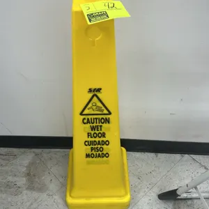 SIR Clean poly wet floor cone. Features a yellow plastic 4-sided design with bilingual English and Spanish warning text reading 'Caution Wet Floor / C
