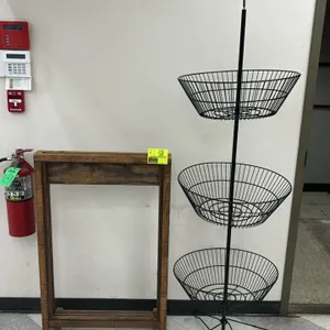 Merchandiser display set. Includes (1) wooden sign stand with a dark brown stained finish and top-loading slot, and (1) black metal 3-tier round wire 
