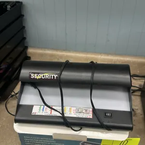 Magner Security Authenticator UV counterfeit banknote detector. Designed to verify the authenticity of banknotes, credit cards, and ID documents. Feat